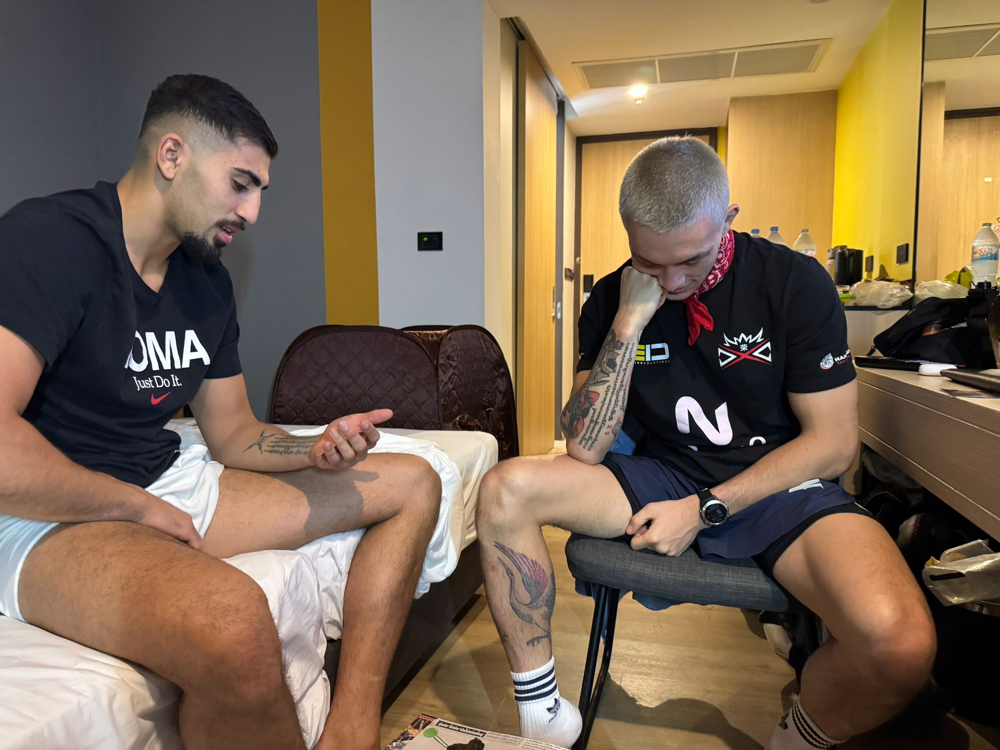 Dalian Dawody playtesting with another fighter at the ONE Championship gala hotel